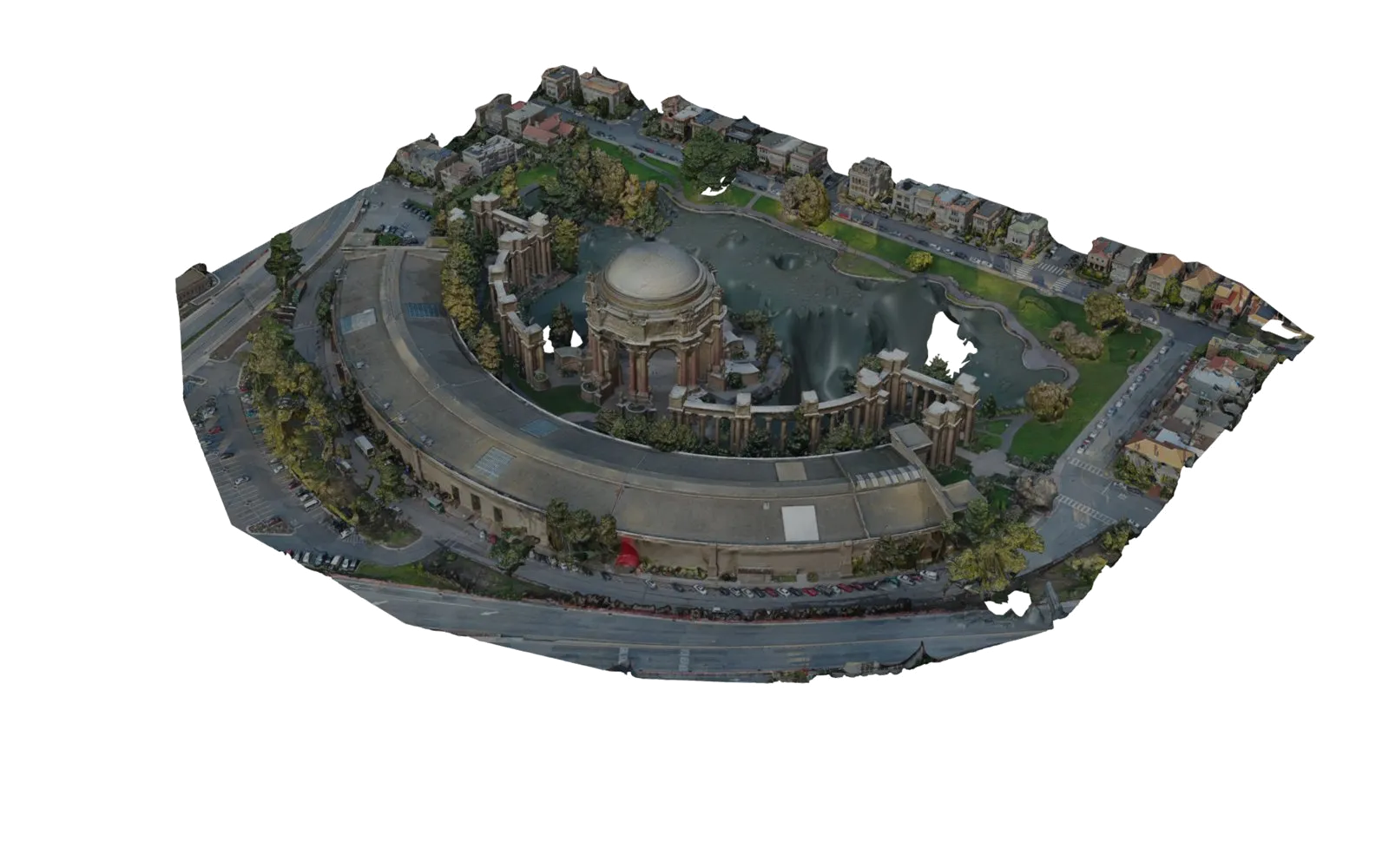Textured photogrammetry model of the Palace of Fine Arts and its lagoon, viewed from above at an angle, with surrounding streets and houses